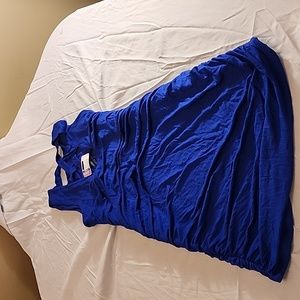 Kneeling blue dress.